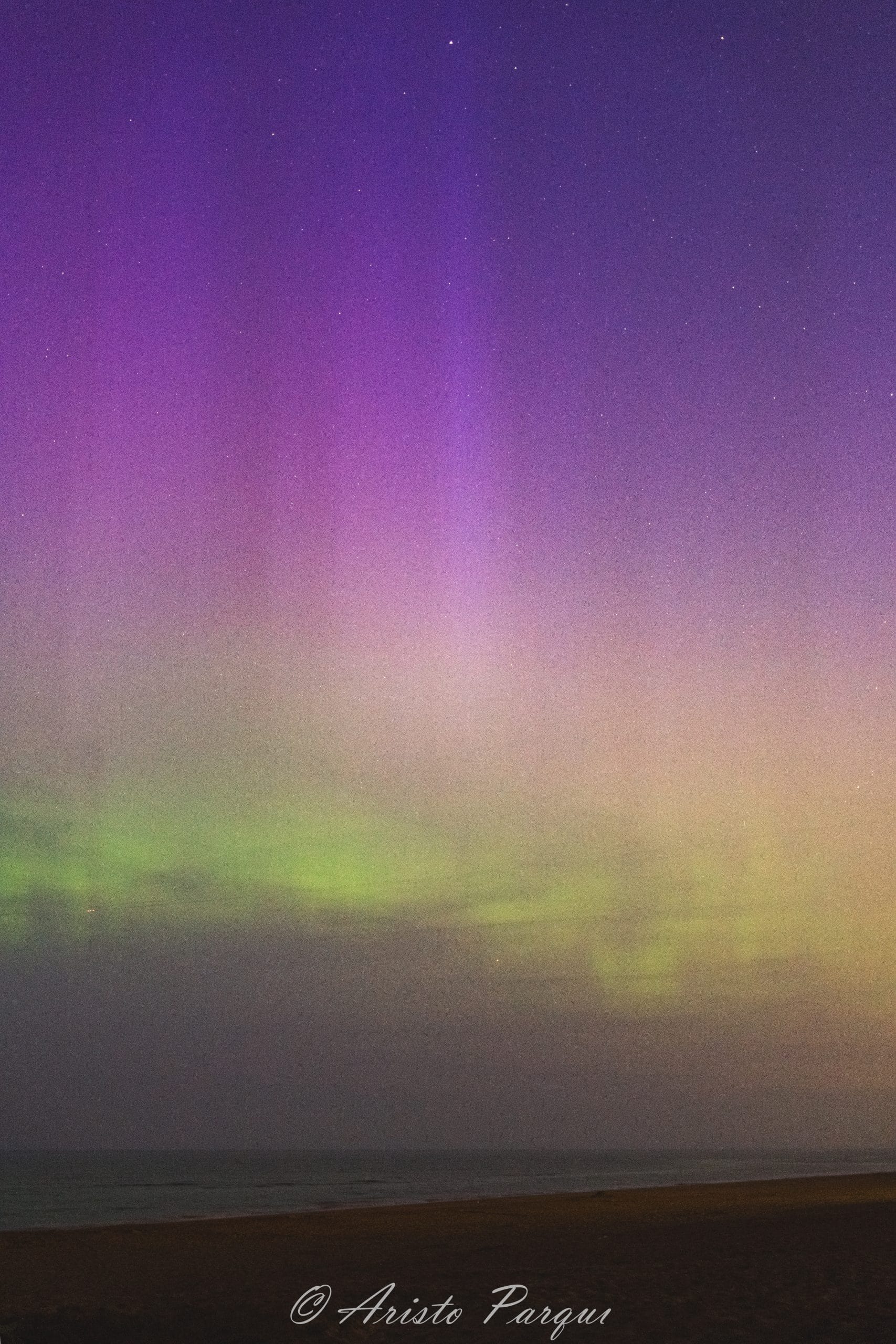 Northern lights in the Netherlands, Wassenaar beach, purple colors, green aurora, purple aurora, pink aurora